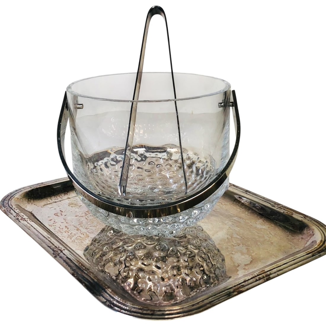 Christofle Tray & Ice-Set: Three pieces of vintage Christofle, including a silverplated tray, small crystal ice bucket, and silverplated tongs. Tongs and tray are signed. Very good condition.Tray: 10 1/4 x 8 x 1/2 inchesIce Buc