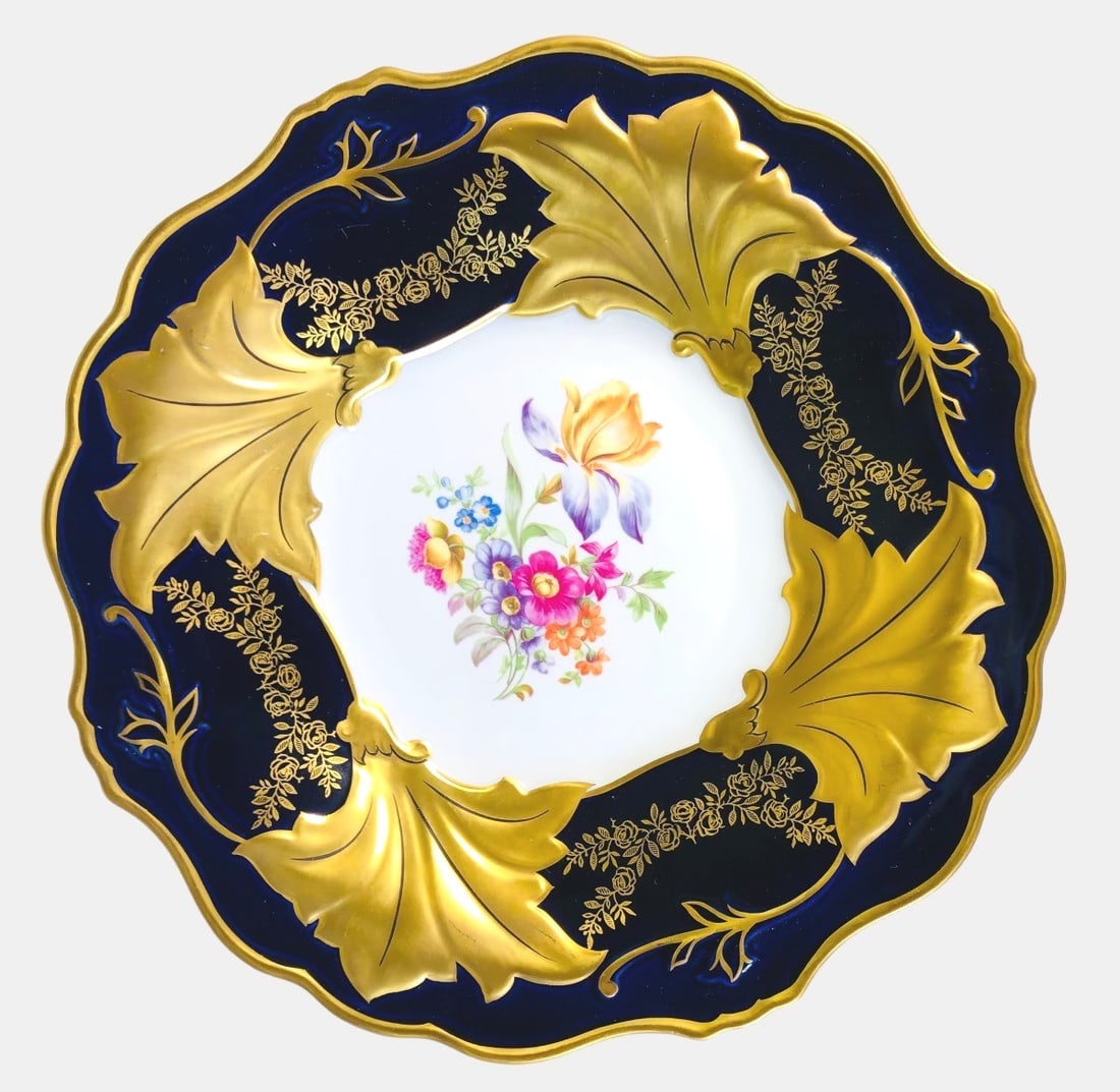 Three Handpainted Porcelain Cabinet Plates: Group of three beautifully handpainted porcelain cabinet plates, East Germany, mid-late 20th century. Dimensions: Dia. 12 3/4 inches (each)