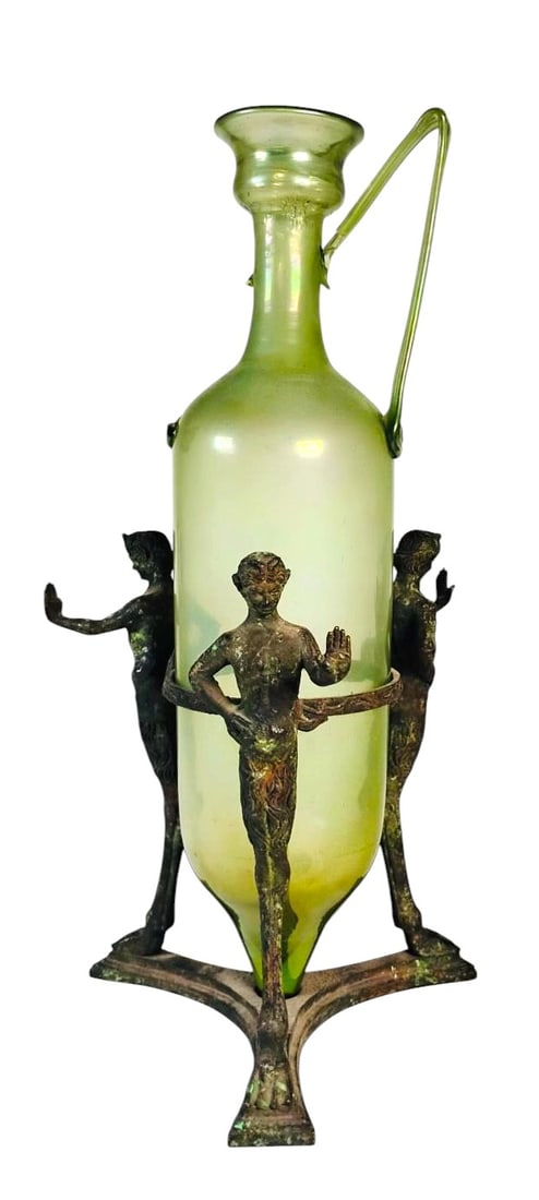 Antique Grand Tour Roman Glass Vessel & Stand: Grand Tour "Roman" blown glass vessel and bronze stand, the glass vessel missing one handle. Probably Italian, circa mid-19th century. Dimensions: H. 13 3/4 inches W. 7 inches