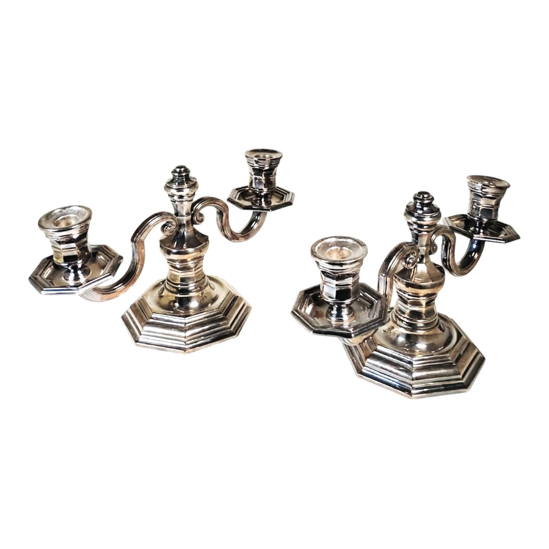 Christofle Candlesticks: Nice pair of of two-branch candle holders by Christofle, Paris. Hallmarked. Very good condition. Dimensions: W. 13 inches H. 7 1/2 inches D. 5 1/2 inches