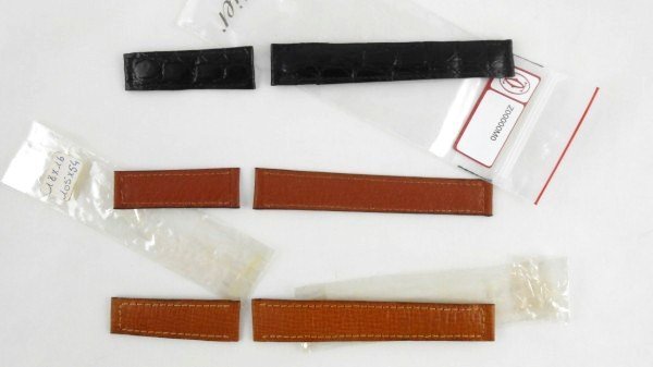 Cartier Watch Straps, Never Used: Group of three Cartier watch straps, one black alligator, two brown leather. Purchased in Paris by the consignor and never used. Current retail replacement cost is approximately $1000. SHIPPING NOTE: 