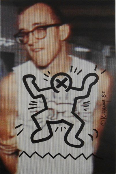 Keith Haring (1958-1990) Souvenir Drawing: Black marker pen on page from "Art in Transit," by/attributed to Keith Haring (1958-1990). Signed along the righthand edge and dated '85. 11 7/8 x 7 3/4 inches. Very good condition. Unframed.Provenanc