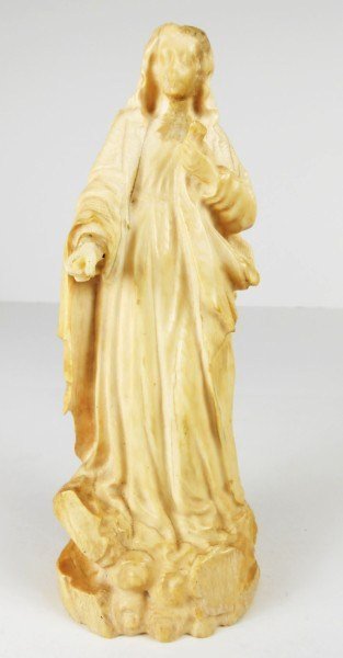 Carved Ivory Of The Virgin Mary, 19th Century: Having flowing hair. Possibly Southern European. Circa early 18th century. H. 7 1/8 inches.