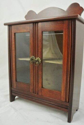 Miniature Armoire, Circa 1890: Hand made miniature two-door armoire. Probably English or American, circa 1880-1900. H. 11 inches. W. 8 1/2 inches. D. 4 inches.