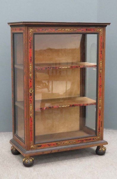 English Tortoise & Gilt Bronze Mounted Vitrine: Nicely proportioned vitrine in the manner of Boulle, having red tortoise veneer with gilt bronze mounts, and terminating in original ball and claw feet, suggesting an English attribution. Circa 19th c