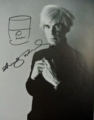 Andy Warhol (1928-1987) Signed Soup Can Sketch: Original autographed soup can souvenir sketch by Andy Warhol (1928-1987). Executed on a page printed with a photograph of the artist. Text on reverse, as published. 11 x 8 1/2 inches. Very good overal