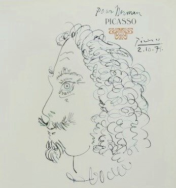 Pablo Picasso (1881-1973) Pen & Ink Drawing: Exceptional pen & ink drawing, portrait of a man with moustache and beard, drawn on a printed page from "Picasso." Attributed to Pablo Picasso (1881-1973). Signed, inscribed, and dated 1971. 10 3/8 x 