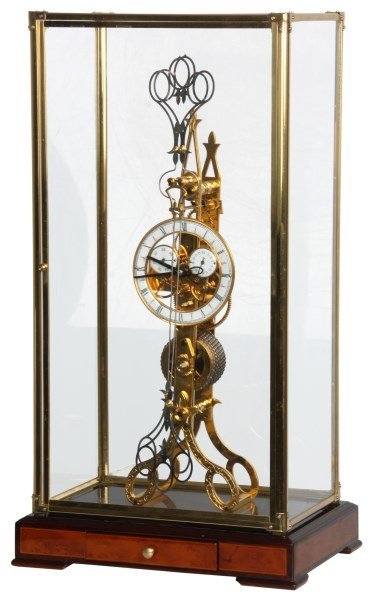 Scissor Pendulum Fusee Skeleton Clock: Scissor pendulum fusee skeleton clock, circa 20th century. Fancy engraved pierced scissor shaped brass plates with vertical stacked gears over the chain fusee spring driving the clock, has fancy pierc