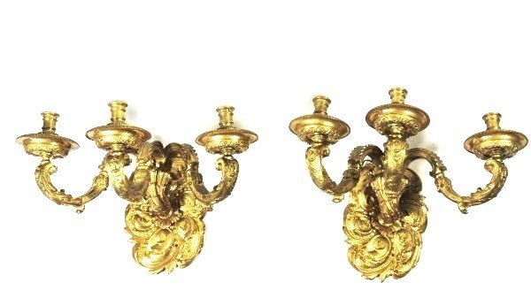 Pair Very Fine French Wall Sconces, 19th Century: Exceptional pair of cast and hand chiseled three-branch gilt bronze sconces in the manner of Andre Charles Boulle (1642-1732). French, circa 19th century. H. 14 inches. W. 18 inches. D. 14 inches. Exc