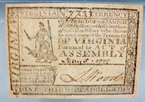 Colonial Currency, VA, May 5, 1777: One Third of a Dollar. (May 5, 1777 Handwritten Date). PMG graded Choice Very Fine-35. Fr. VA-113. This Virginia note has four very large even margins which create excellent centering for the central 
