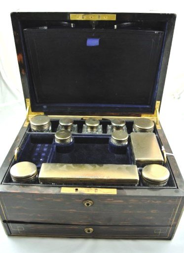 English Fitted Dressing Box, 19th Century: Finely inlaid gentleman's fitted dressing box with sterling silver-lidded jars and accessories (one jar missing). Locks by Bramah, London. W. 13 1/2 inches. D. 10 inches. H. 8 inches. Bramah is London