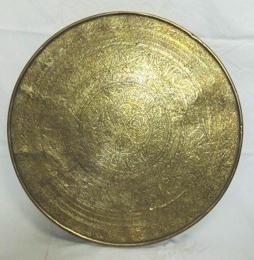 Persian Brass Plaque, Hand-Hammered, 19th C.: Hand hammered brass plaque (possibly a table top), Persia, circa late 19th/early 20th century. Dia. 23 1/2 inches.