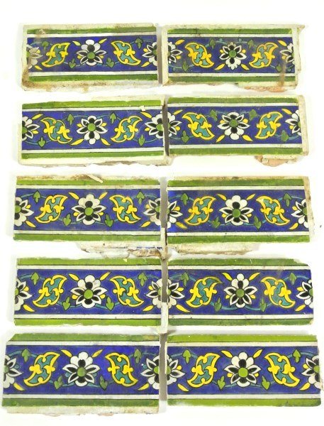 Persian Or Turkish Tiles, Circa 18th Century Or Earlier: Group of 10 Persian (possibly Turkish) tiles, circa 18th century or earlier. Decorated in shades of blue, yellow, and green, with stylized flower heads and scrolling foliage. 4 1/2 x 9 1/2 inches each