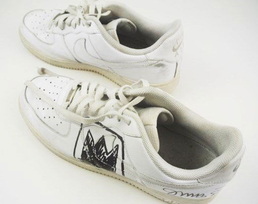 Jean-Michel Basquiat (1960-1988) Tennis Shoes: Pair of Nike AF-1 tennis (running) shoes, signed and dated attributed to/in the manner of Jean-Michel Basquiat (1960-1988) in black marker pen. Very good condition.Provenance: Acquired by the previous