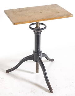 Industrial Adjustable Work Table: Iron tri legged base with adjustable wheel. Oak rectangular top. Great patina. 15 w x 24 d x 30h