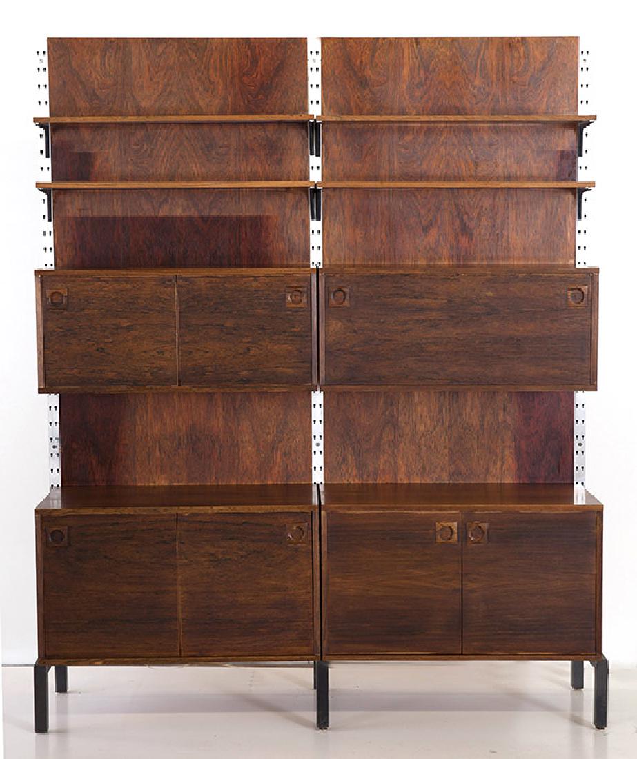 Free Standing Danish Wall Unit: Modular wall unit, designer unknown. Distributed by Raymor. Three posts, two back panels, four cabinets and four shelves. Size 66 1/4 X 17d X 81 1/4h.