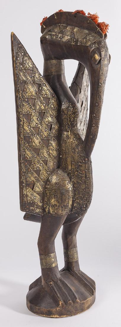 Antique Senufo Porplanong African Hornbill Statue: Circa 1940's, carved wood with applied metal 8 1/2w x 7d x 24h