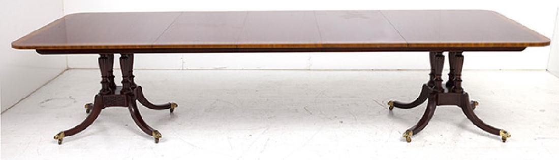 Baker Historical Charleston Dining Table: Outstanding mahogany dining table with three inch satin band inlay border. Double pedestal Duncan Phyfe style base. Closed 70" long x 46w x 29d. Three 20" leaves 120 inches long when open