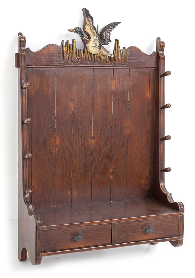 Romweber Gun Rack: Fine Viking Oak Wall mount gun rack with flying duck pediment. Bow tie wood joint, two drawers and dowel rods. Original finish.