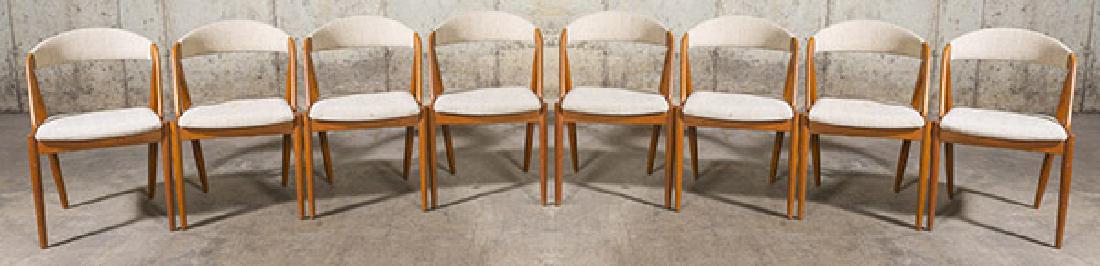 Kai Kristiansen Dining Chairs: Dining chairs. Set of eight. Model 321. Schov Andersen. 1060's. Teak and upholstery. 20w x 20 1/4d x 29 1/4h Height 17 3/4.