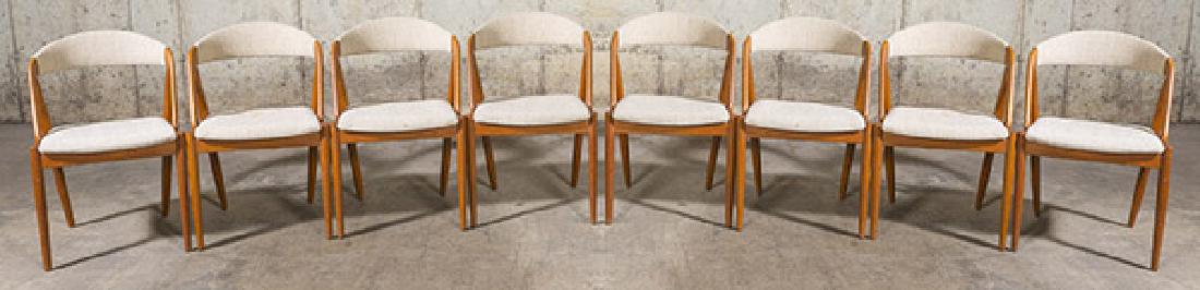 Kai Kristiansen Dining Chairs: Dining chairs. Set of eight. Model 321. Schov Andersen. 1060's. Teak and upholstery. 20w x 20 1/4d x 29 1/4h Height 17 3/4.