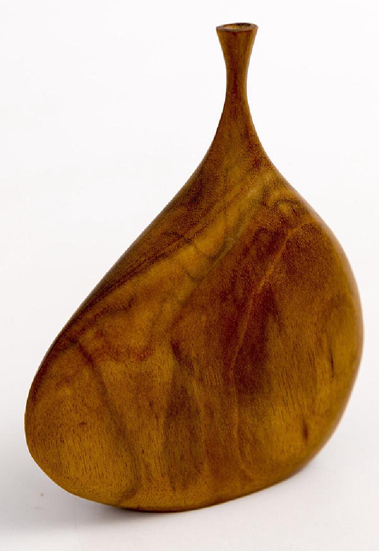 Doug Ayers (20th Century) Vase: Sculptured vase, Goncalo Alvis wood, dated 1984. Great example of Ayers work. Signature to underside. 4 1/2 x 1 1/2d x 5 7/8h
