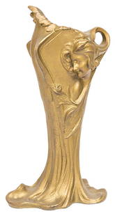 Art Nouveau Gilded Vase: French, circa 1900. Gilded metal with embossed lady. Lady's hair scrolls up to continue the design while her gown drapes down to form base. Different on each side. 7 1/2w x 5 1/2d x 14 3/4h.