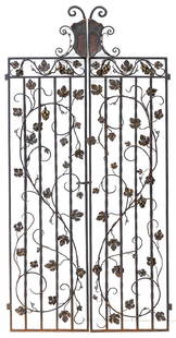 Art Nouveau Iron Gates: Pair of iron gates, circa 1910-1920. Floral and grape vine pattern. Scrolled top to center forming a shield when closed. Original latch and cold cast paint. 16 1/4w x 2d x 68 3/4h (width together 32