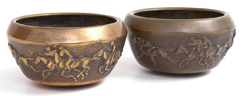 Bronze bowls with Polo Players: Pair of copper lustered bronze bowls with embossed polo players. Heavy and quality. 6 dia. x 3 3/8h.