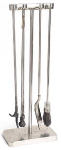 Virginia Metalcrafters Fireplace Tools: Fireplace tools. Modernist polished steel stand with interlocking tools. Manufacturer's branded mark to metal. 11w x 5 3/4d x 30h. Collection of David Harriman