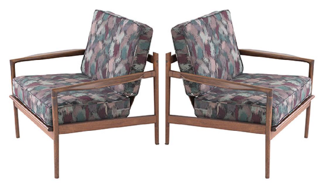 Ib Kofod-Larsen Picket Back lounge Chairs: Lounge chairs, pair. Selig, 1960's. Denmark. Walnut and upholstery. 30w x 29d x 19h (seat height 19).