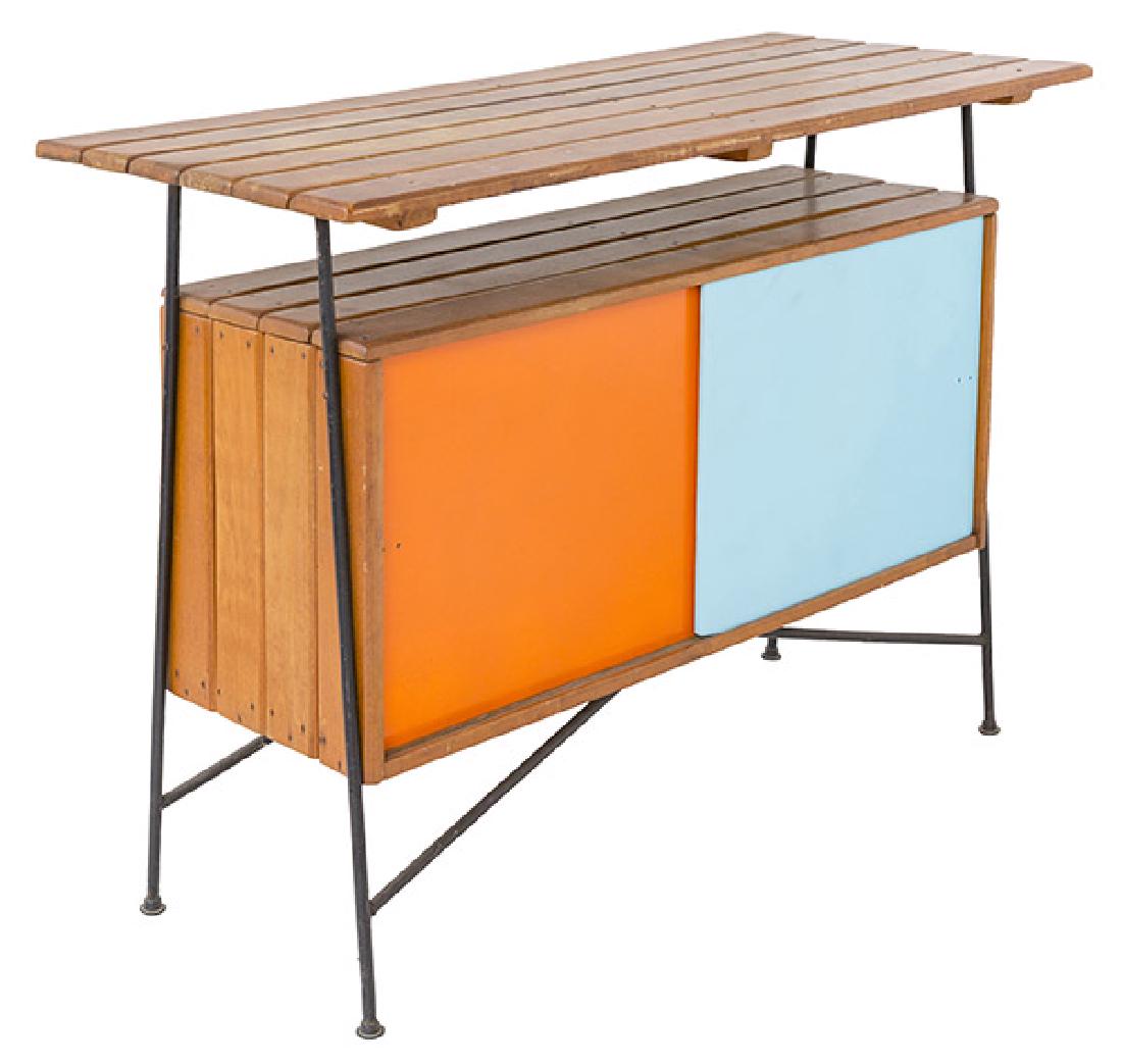 Arthur Umanoff Cabinet: Small cabinet/server. Raymor, 1950's. Iron, walnut, Masonite, leather. Features two sliding glass doors with interior storage. 42w x 18d x 32 1/4h.