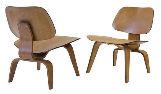 Charles & Ray Eames Early LCW’s: Lounge chair wood, pair (22 1/2w x 24d x 27h). Evans Products/ Herman Miller, USA, 1945. Birch plywood, rubber. Signed with applied decal manufacturer’s label to underside: [Manufactured by Evans