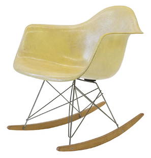 Charles & Ray Eames RAR: 1st generation rocker. (25w x 26 d x 26 1/2h). Zenith plastics/Herman Miller. USA, 1950. Large shock mounts, with rope edge. Manufacturer’s label. Molded fiberglass,enameled steel, birch, rubber. Li