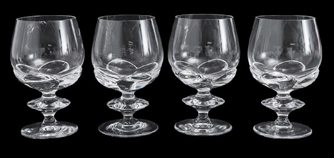 Lalique glasses: Water glasses, set of four. France. Manufacturer incised signature to underside. 3 3/4 dia. x 6h.