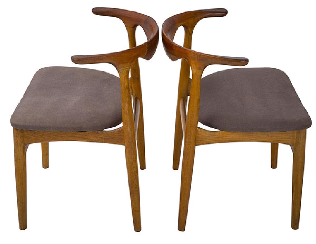 In the Manner of Hans Wegner: Cow horn chairs, possibly Johannes Hansen. 1950's. Teak, upholstery. 22 1/2w x 18d x 29h.