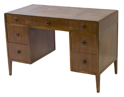 Edward Wormley Desk: Desk. Dunbar. 1940's. Seven drawers. Mahogany, leather, brass. 46w x 22 1/2d x 24h.