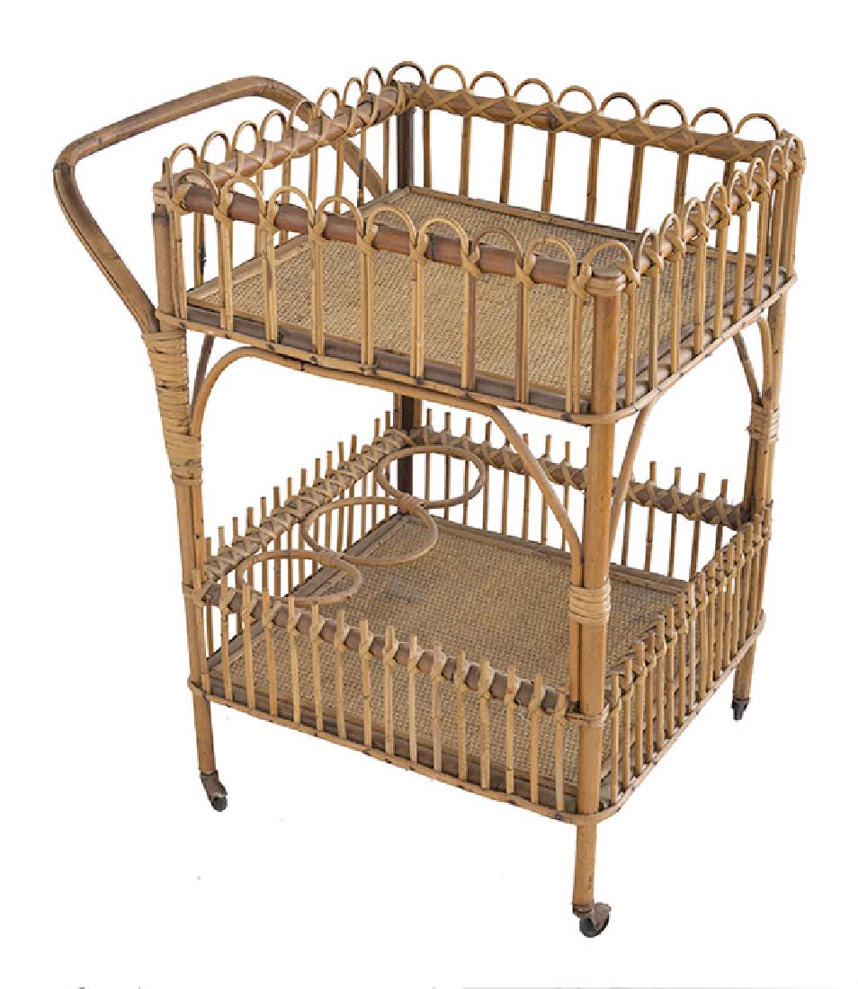 Italian Wicker Tea Cart: Two tier wicker tea cart with handle and wine holders. 1960's. Wicker, brass, cane. 25 1/4w x 14 1/2d x 28 1/2h.