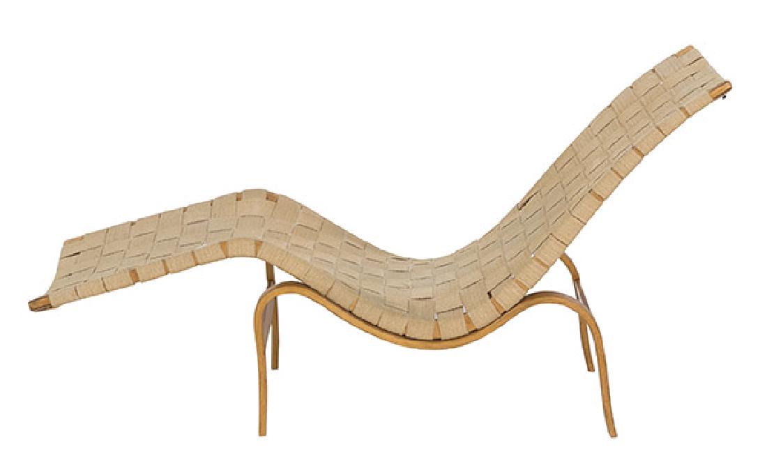 Bruno Mathsson Chaise Lounge: Chaise lounge. Karl Mathsson. Signed with applied manufacturer's label to underside. Laminated stembet beech, canvas. 61w x 20d x 33h.