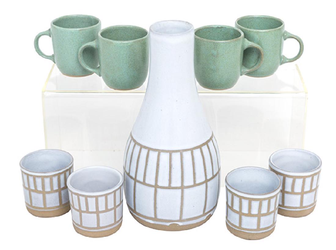 Gordon & Jane Martz Carafe Plus: Carafe and set of four cups. Four odd cups. Marshall Studios, 1950's. Incised signature to underside, Martz. Carafe; 4 1/2 dia x 9 1/2h, cups; 2 1/2 dia x 2 5/8h.