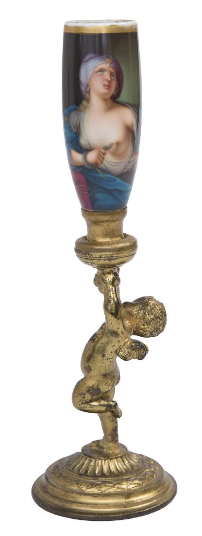 Rare Pair point Bronze Cherub Base with Porcelain Vase: Bronze gilded Pairport cherub base #4970 holding a hand painted half nude lady reclining. manufacture's mark to base. 2 7/8DIA x 9 3/8H.