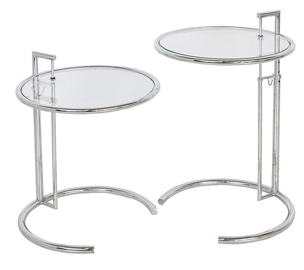 In the Style of Eileen Gray Occasional Table: Adjustable tables, pair. Original pin mechanism. Original price $1,200 each. Chrome-plated steel, glass. 20 dia x 24" to 40".