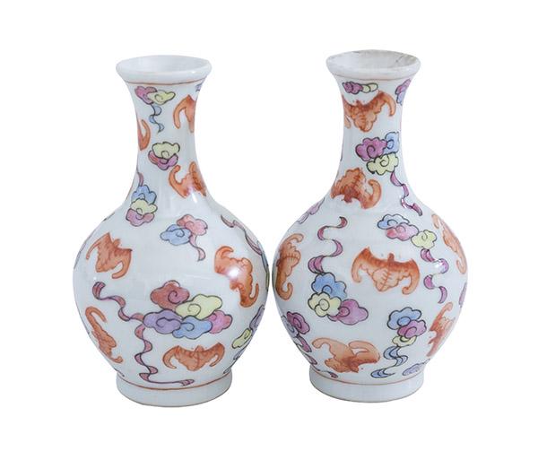 Chinese Porcelain Cabinet Vases: Pair of miniature porcelain vases with floral motif. Signed with characters to bottom. 2 1/2dia x 4h.