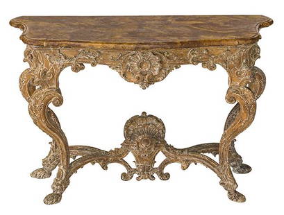 18th Century Italian Baroque Console: Console with heavily carved base with cabriole legs and carved knee bends and floral and shell motif. Scalloped faux marble top. Original top (it has been redone). 53 3/4w x 26 1/2d x 34 1/4h.