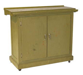 Painted Country Store Cabinet: Two door painted cabinet with molded top (perfect for small store counter) and base. Castors have been added and has replaced pulls. 48w x 21 1/2d x 41 1/2h