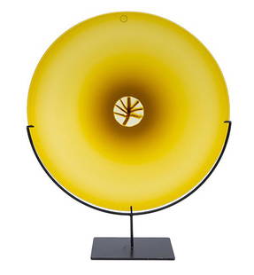 Laura de Santillana Quattro Stagioni: Venini, Italy, 1976, Murrine plate in yellow glass with large murrina. 13 3/4 dia x 1 3/4h. Incised signature, date and number to reverse: (Venini Laura 1976/15) Original pamphlet.