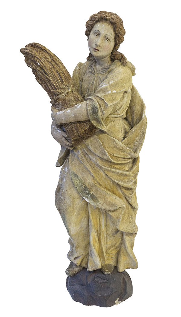 18th Century Plaster Sculpture of Lady: Circa 1770-1790, sculpture of a lady wearing cloak holding a bundle of grain. 20w x 13 1/2d x 45 1/2h.