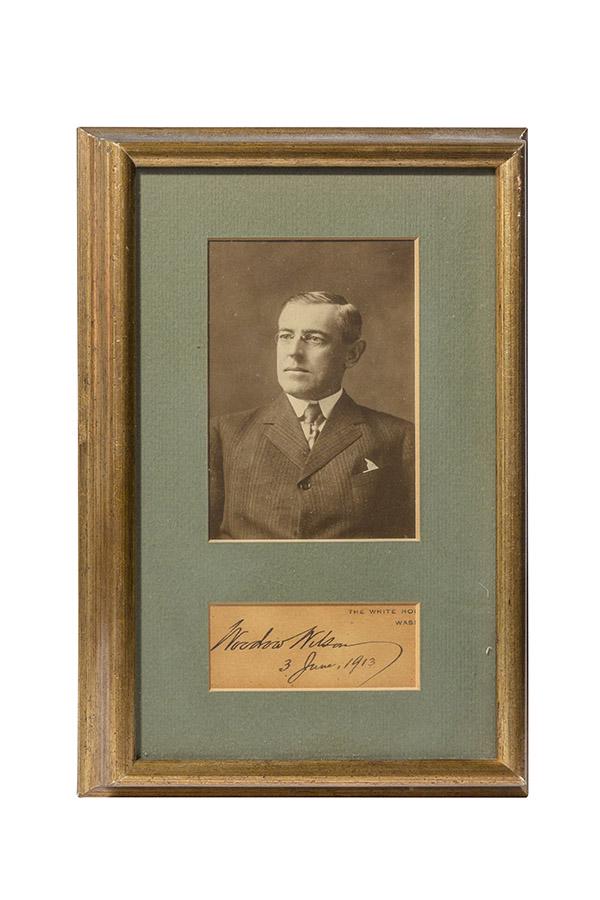 Woodrow Wilson Presidential Signature: Framed photograph and original Woodrow Wilson signature during his presidency and dated June 3rd, 1913