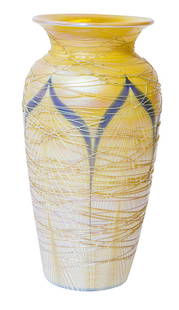 Durand Gold Threaded Pulled Feather Vase: Signed Durand iridescent amber and yellow with green pulled feather patterns and a textured body with gold threading. 8" 3/4" H x 4" Diameter