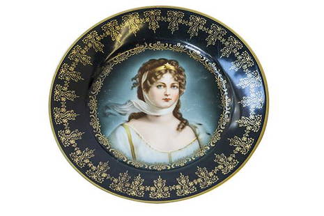 Royal Vienna Queen Louise Portrait Plate: Royal Vienna porcelain plate with a hand painted portrait of Queen Louise of Prussia. Cobalt blue rim decorated with gold accents. Underglaze blue beehive mark on reverse side. 9 1/2" Diameter